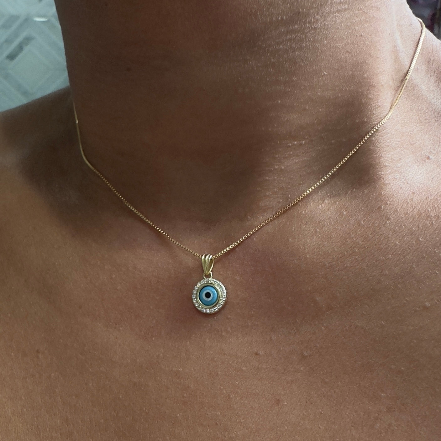 micro round eye pendant